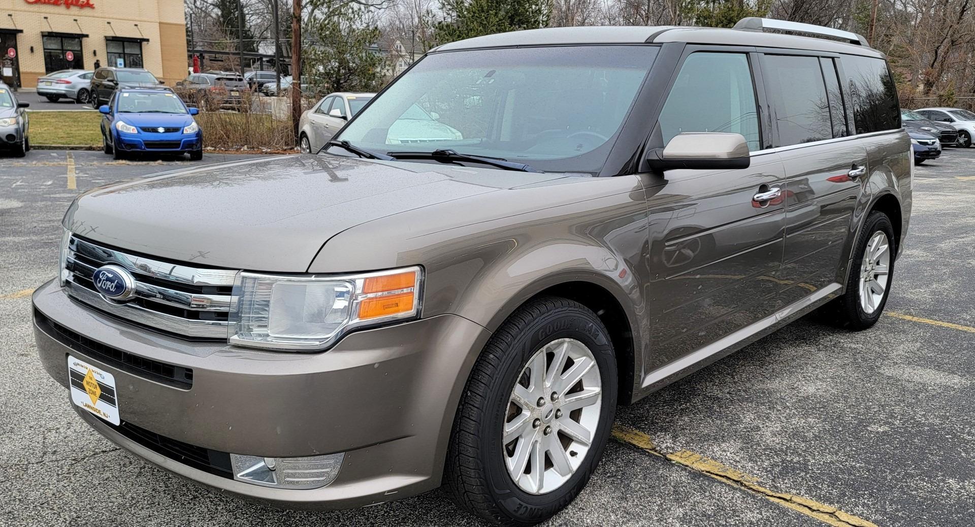 2012 Brown /Black Leather Ford Flex SEL AWD (2FMHK6CC6CB) with an 3.5L V6 DOHC 24V engine, 6-Speed Automatic Overdrive transmission, located at 341 N White Horse Pike, Lawnside, NJ, 08045, (856) 262-9500, 39.855621, -75.027451 - Photo#1